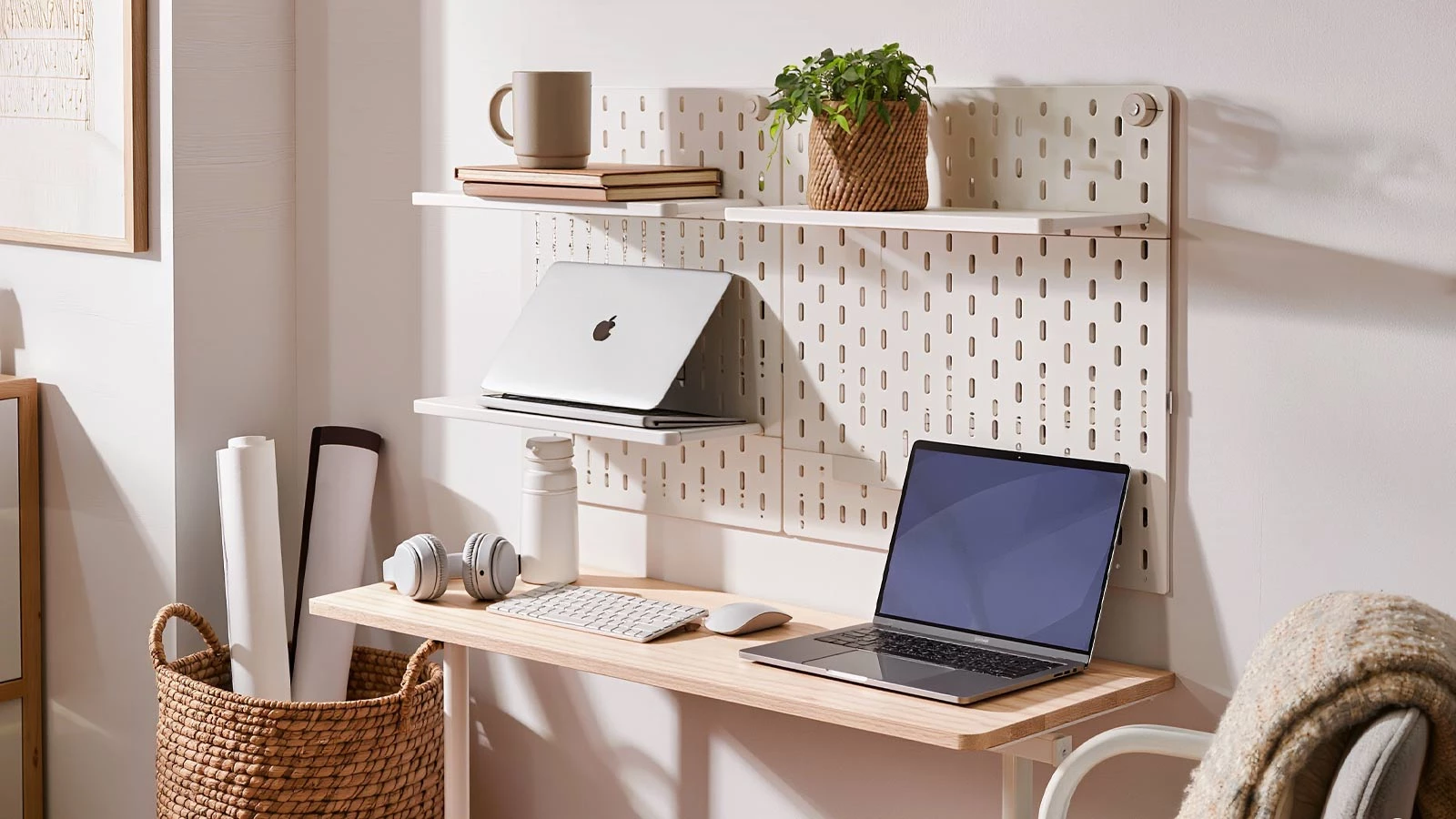 Small studio apartment home office corner featuring renter-friendly adhesive floating shelf storage for work-from-home organization