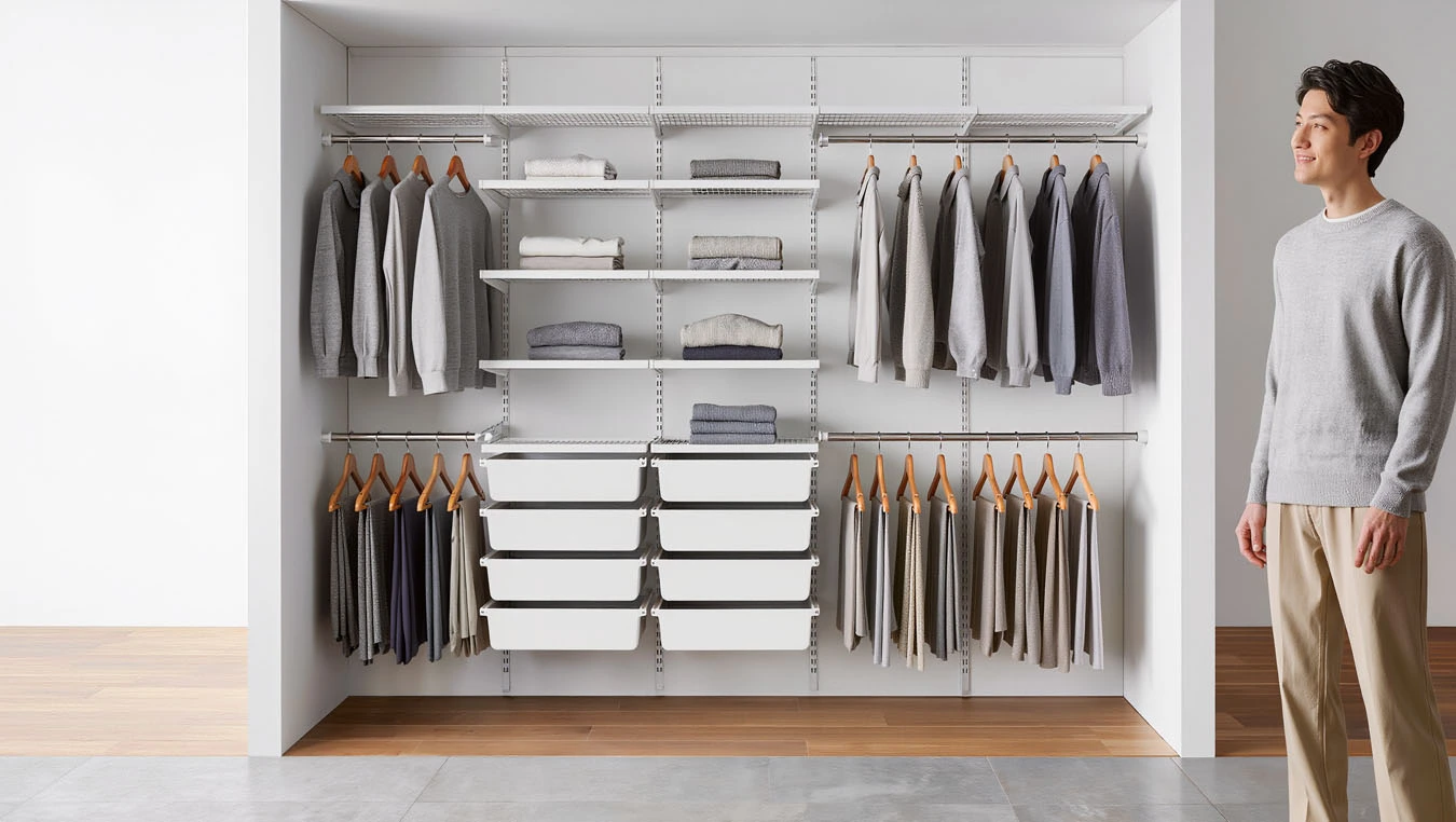 Clothing & wardrobe overflow in a small studio apartment open closet / wardrobe wall using expandable closet rods